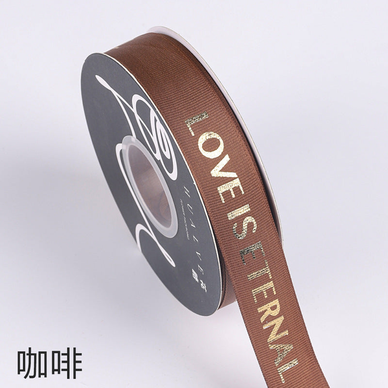 SH-2.5 cm woven ribbon, fresh flower packaging ribbon, floral art hot-stamped spiral pattern satin ribbon, English alphabet bouquet cake gift ribbon.