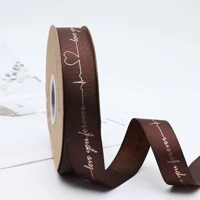 SH-2.5 cm woven ribbon, fresh flower packaging ribbon, floral art hot-stamped spiral pattern satin ribbon, English alphabet bouquet cake gift ribbon.